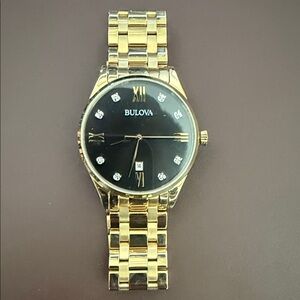 Bulova Men's Watch with Gold Band and Black Dial
